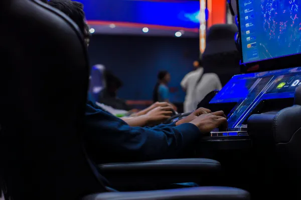 JETA90 Jackpot Slots — Spin for massive rewards A dramatic shot of winning sevens landing on a slot reel surrounded by shining gold coins, symbolizing big wins.